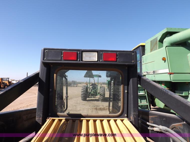 image for item H9012 1999 New Holland LX985 skid steer