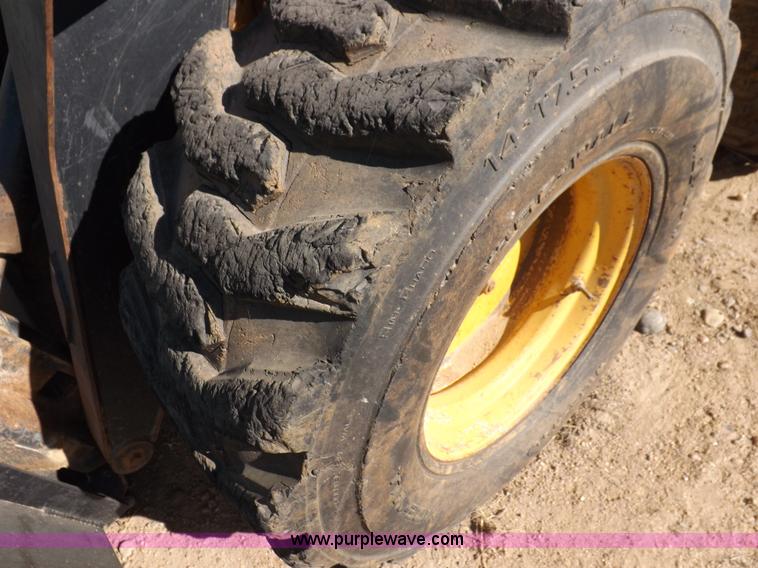 image for item H9012 1999 New Holland LX985 skid steer