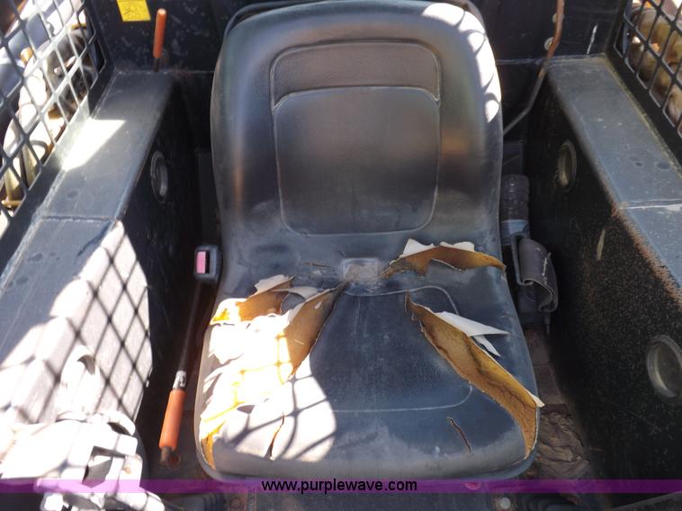 image for item H9012 1999 New Holland LX985 skid steer