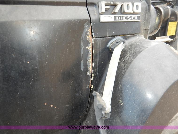 image for item I5297 1989 Ford F700 Custom Cab flatbed truck