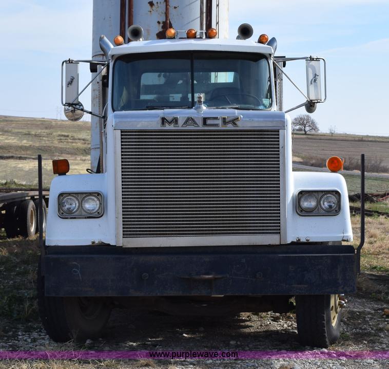 image for item I8662 1985 Mack RWS 722LST Super Liner flatbed truck