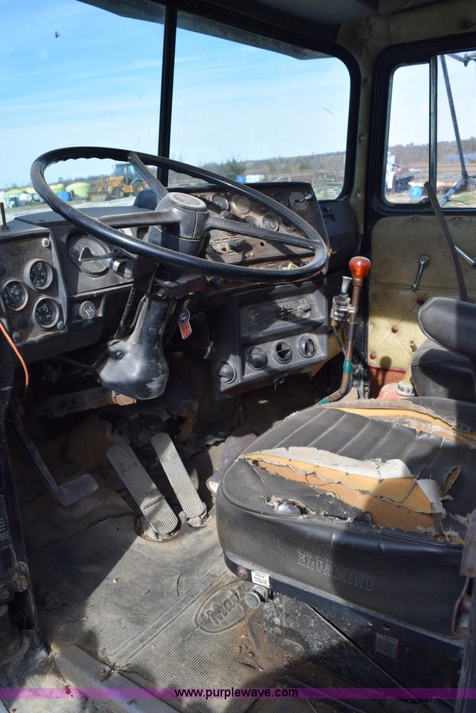 image for item I8662 1985 Mack RWS 722LST Super Liner flatbed truck