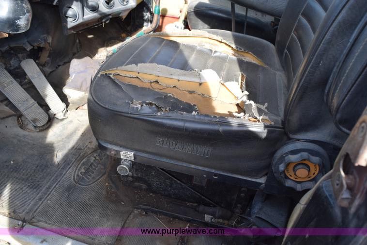 image for item I8662 1985 Mack RWS 722LST Super Liner flatbed truck