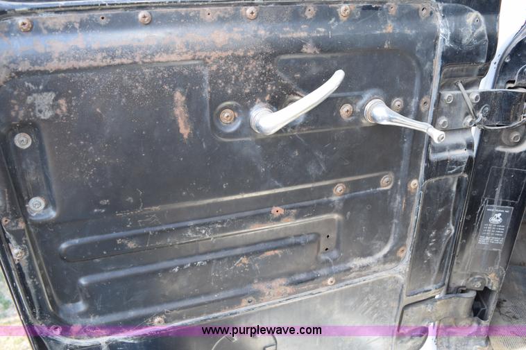 image for item I8662 1985 Mack RWS 722LST Super Liner flatbed truck