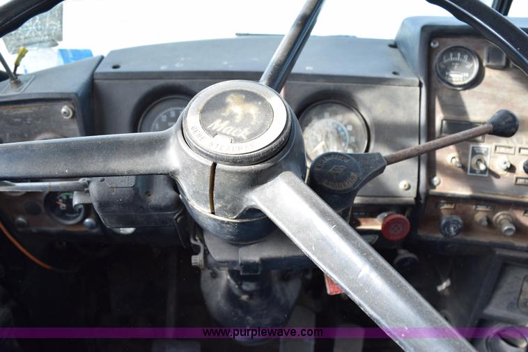 image for item I8662 1985 Mack RWS 722LST Super Liner flatbed truck