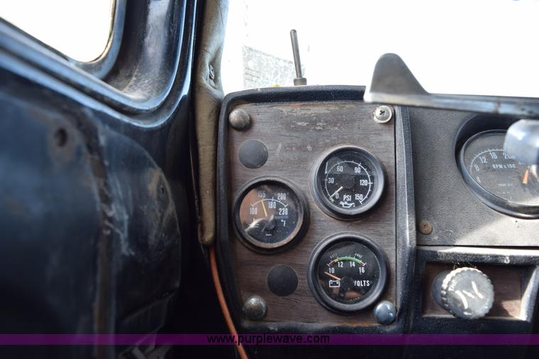 image for item I8662 1985 Mack RWS 722LST Super Liner flatbed truck