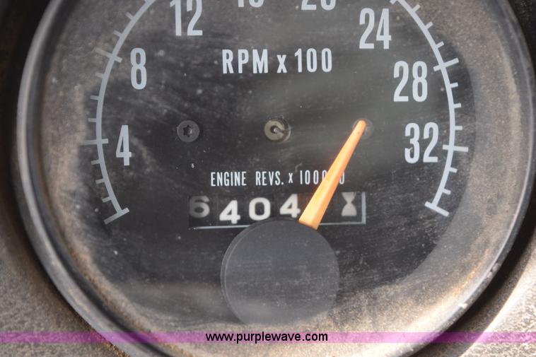 image for item I8662 1985 Mack RWS 722LST Super Liner flatbed truck