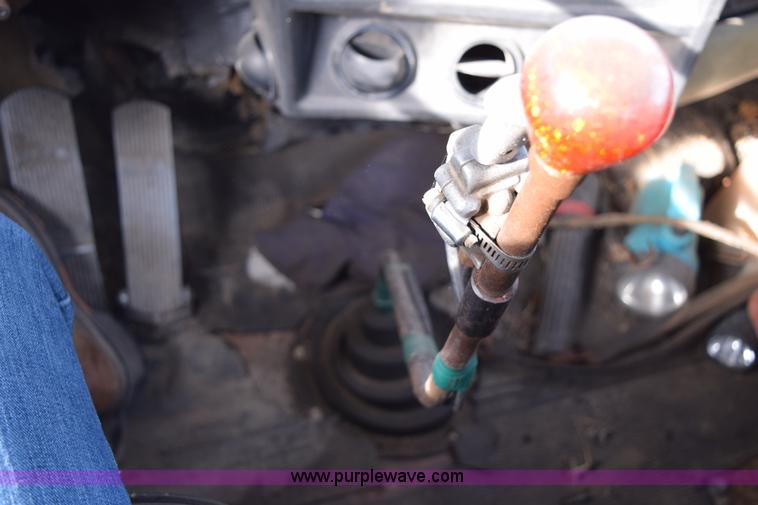 image for item I8662 1985 Mack RWS 722LST Super Liner flatbed truck