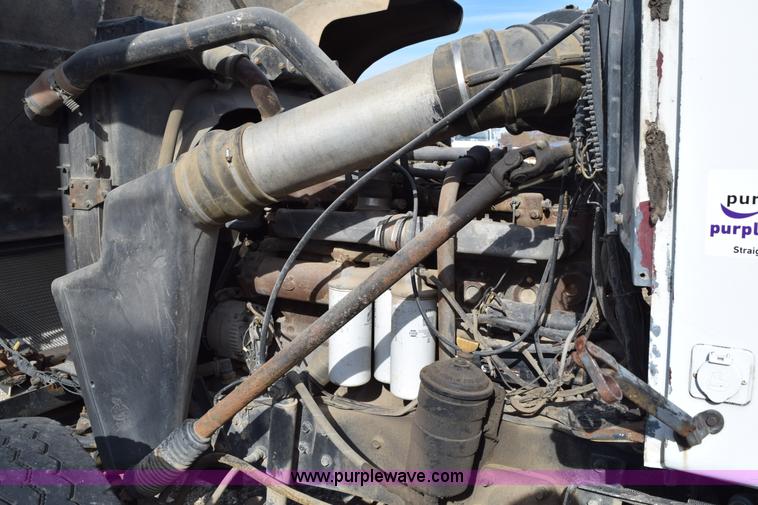 image for item I8662 1985 Mack RWS 722LST Super Liner flatbed truck