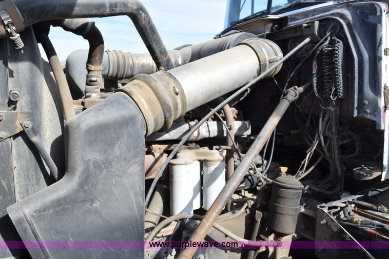 image for item I8662 1985 Mack RWS 722LST Super Liner flatbed truck