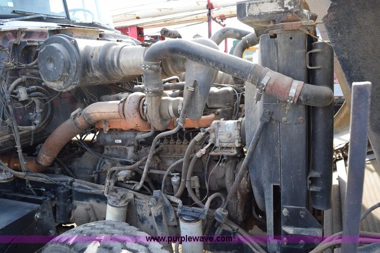 image for item I8662 1985 Mack RWS 722LST Super Liner flatbed truck