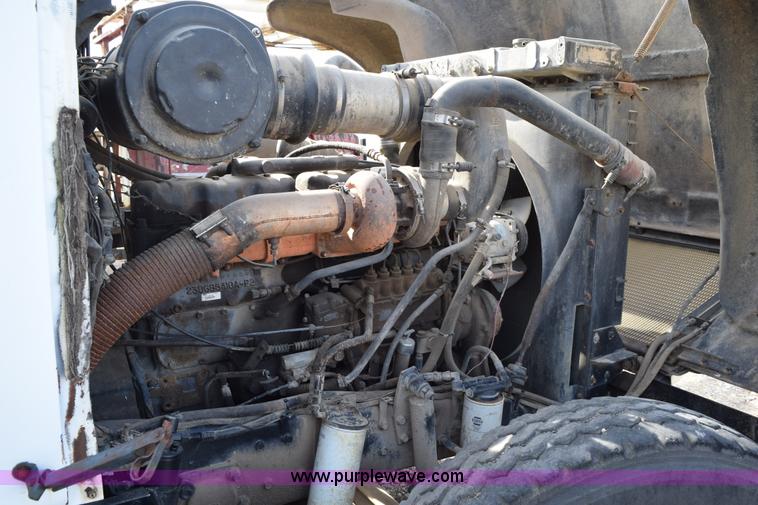 image for item I8662 1985 Mack RWS 722LST Super Liner flatbed truck