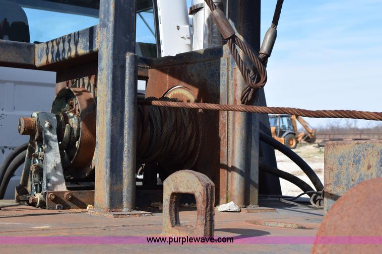 image for item I8662 1985 Mack RWS 722LST Super Liner flatbed truck