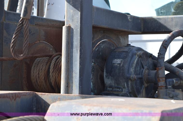 image for item I8662 1985 Mack RWS 722LST Super Liner flatbed truck