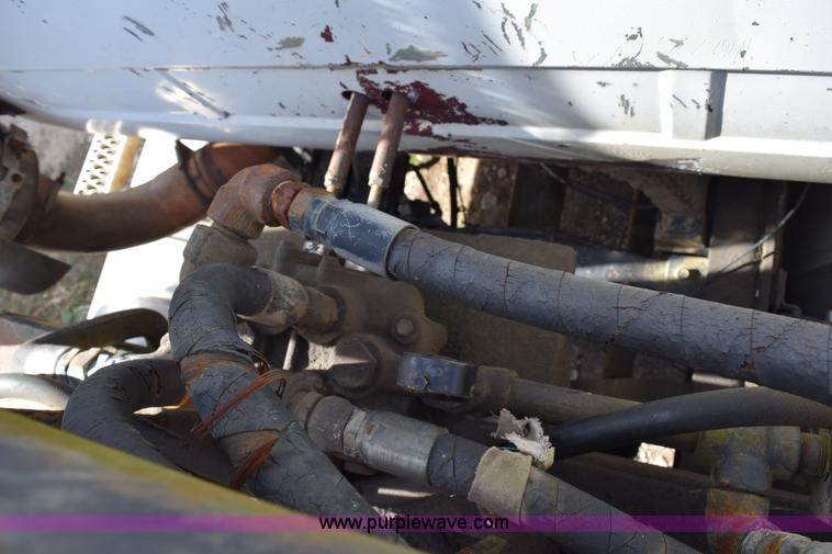 image for item I8662 1985 Mack RWS 722LST Super Liner flatbed truck