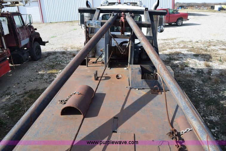 image for item I8662 1985 Mack RWS 722LST Super Liner flatbed truck