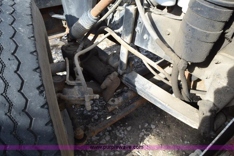 image for item I8662 1985 Mack RWS 722LST Super Liner flatbed truck