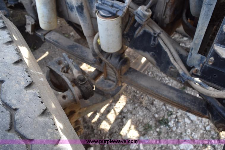 image for item I8662 1985 Mack RWS 722LST Super Liner flatbed truck