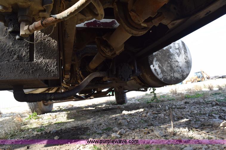 image for item I8662 1985 Mack RWS 722LST Super Liner flatbed truck