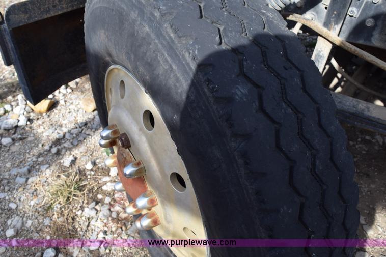 image for item I8662 1985 Mack RWS 722LST Super Liner flatbed truck