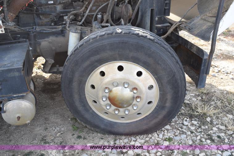 image for item I8662 1985 Mack RWS 722LST Super Liner flatbed truck