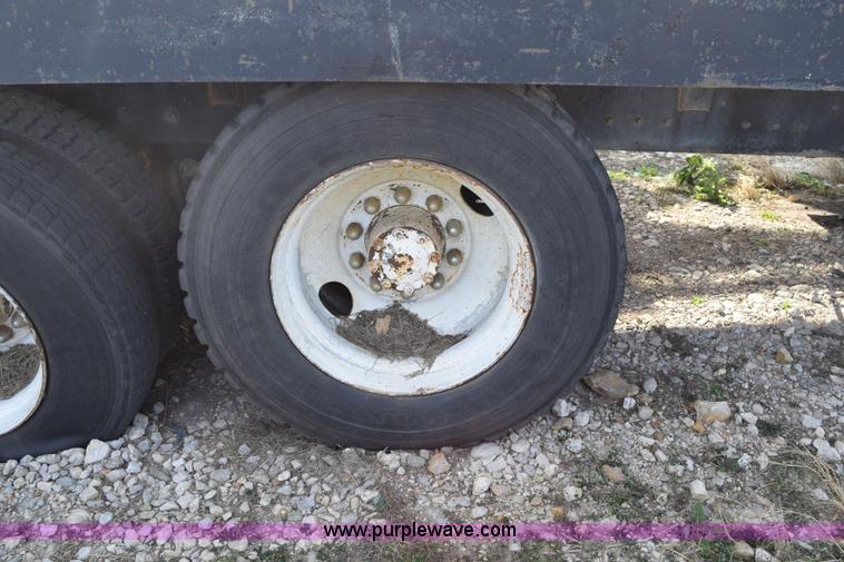 image for item I8662 1985 Mack RWS 722LST Super Liner flatbed truck