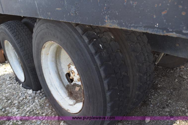 image for item I8662 1985 Mack RWS 722LST Super Liner flatbed truck