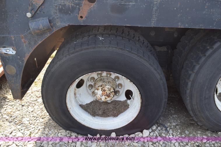 image for item I8662 1985 Mack RWS 722LST Super Liner flatbed truck