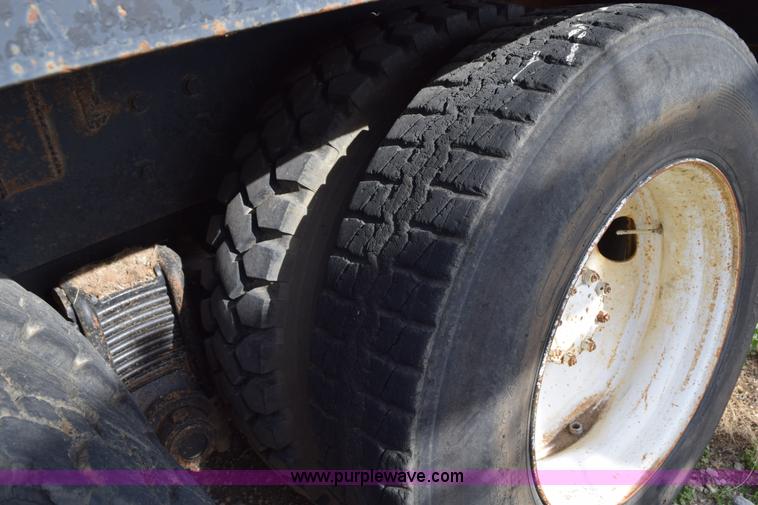 image for item I8662 1985 Mack RWS 722LST Super Liner flatbed truck