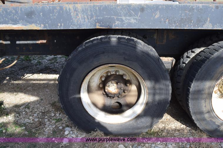 image for item I8662 1985 Mack RWS 722LST Super Liner flatbed truck