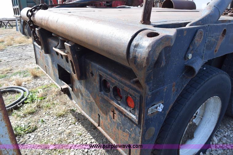 image for item I8662 1985 Mack RWS 722LST Super Liner flatbed truck