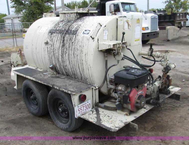 image for item I8685 2004 Ingersoll Rand HT540L pot hole patcher