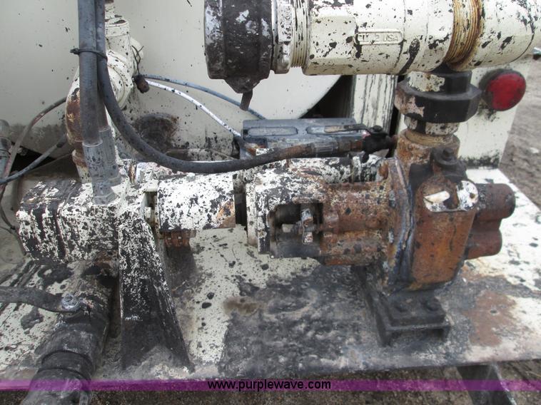 image for item I8685 2004 Ingersoll Rand HT540L pot hole patcher