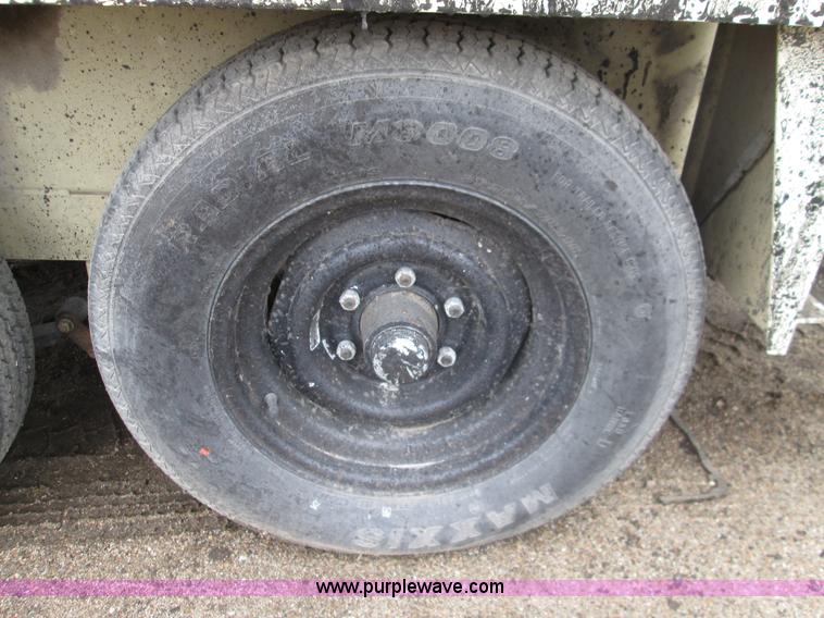 image for item I8685 2004 Ingersoll Rand HT540L pot hole patcher