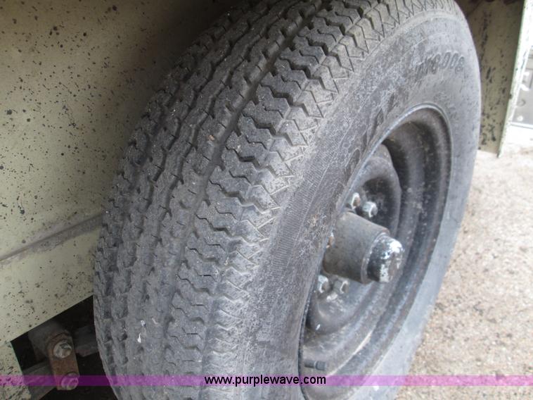 image for item I8685 2004 Ingersoll Rand HT540L pot hole patcher