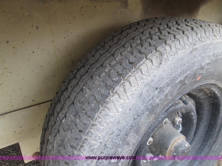 image for item I8685 2004 Ingersoll Rand HT540L pot hole patcher