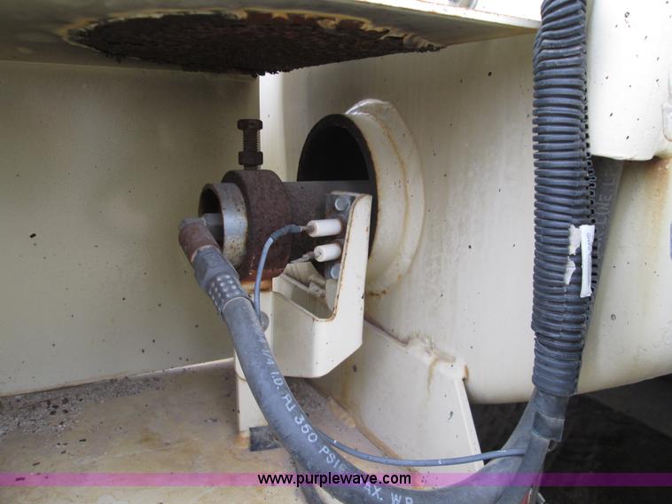 image for item I8685 2004 Ingersoll Rand HT540L pot hole patcher