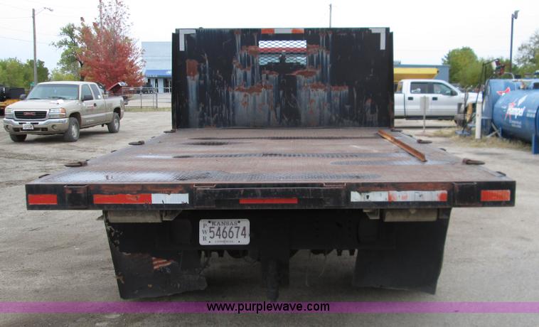 image for item I8687 1989 Ford F700 roll back truck