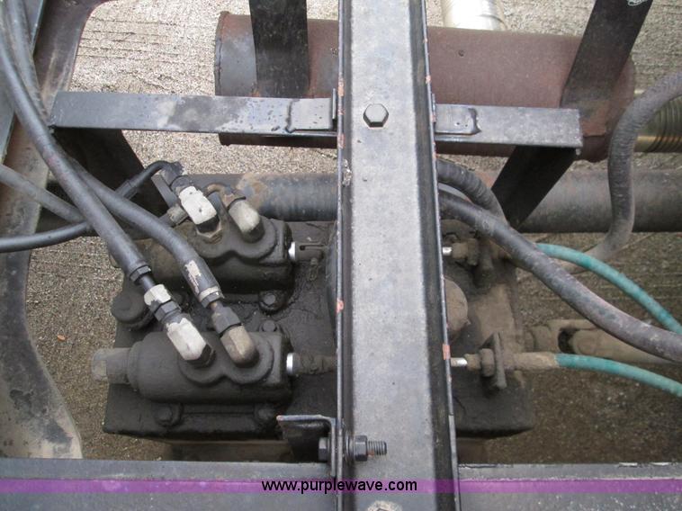 image for item I8687 1989 Ford F700 roll back truck