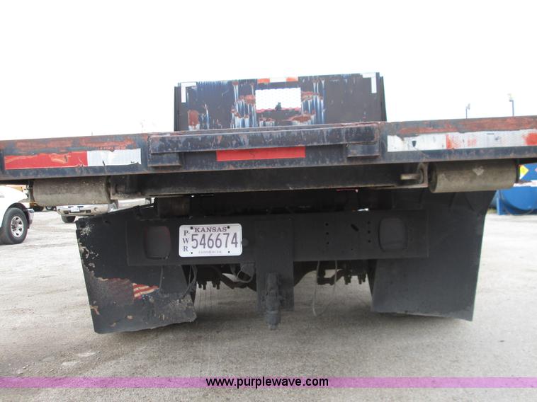 image for item I8687 1989 Ford F700 roll back truck