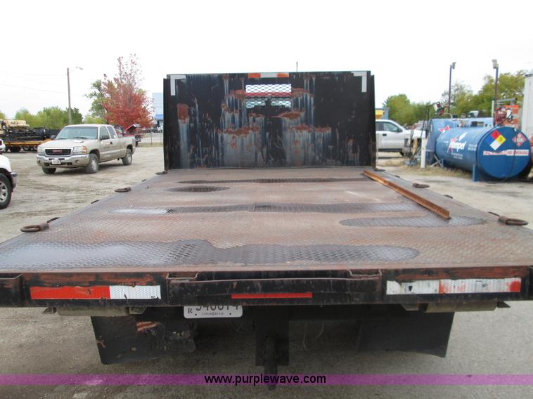image for item I8687 1989 Ford F700 roll back truck