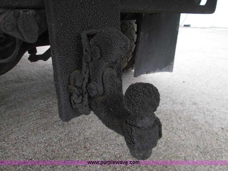 image for item I8687 1989 Ford F700 roll back truck