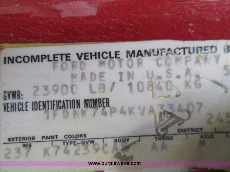 image for item I8687 1989 Ford F700 roll back truck