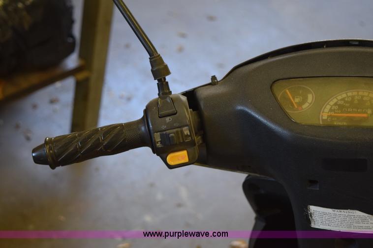 image for item I8649 2011 Tao Tao moped