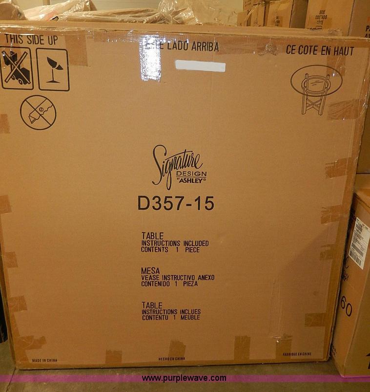 image for item D1302 (7) Ashley Signature Design glass top tables