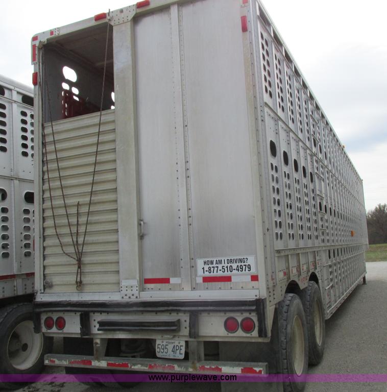 image for item I8886 1999 Wilson PSDCL-302P aluminum livestock trailer