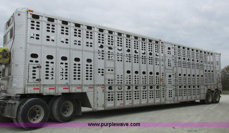image for item I8890 1999 Wilson PSAL-303P aluminum livestock trailer