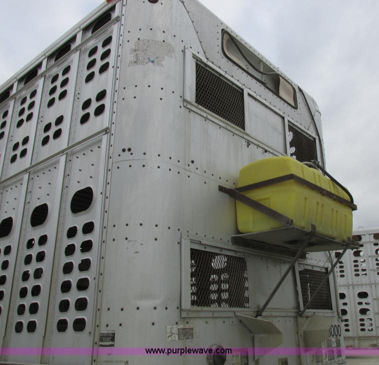 image for item I8890 1999 Wilson PSAL-303P aluminum livestock trailer