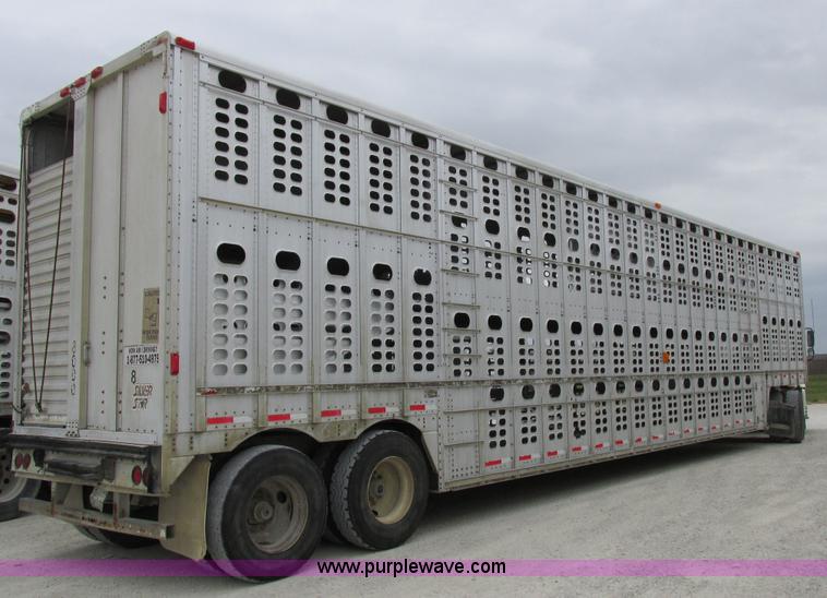image for item I8890 1999 Wilson PSAL-303P aluminum livestock trailer