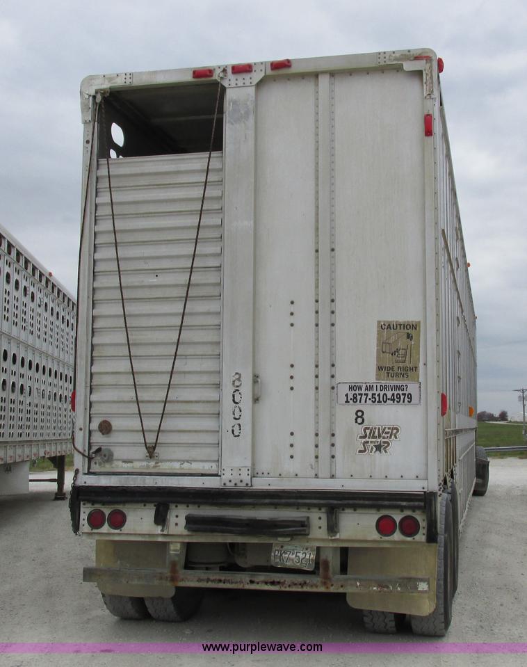 image for item I8890 1999 Wilson PSAL-303P aluminum livestock trailer